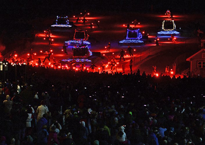 Snow cats lit up for new years